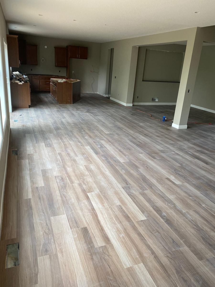 After — blonde LVP open main level