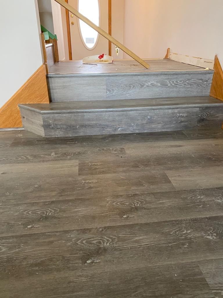 Acacia hardwood floor and hallway steps
