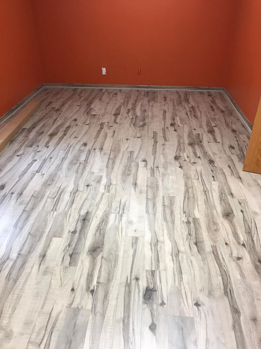 Whitewashed maple laminate bedroom