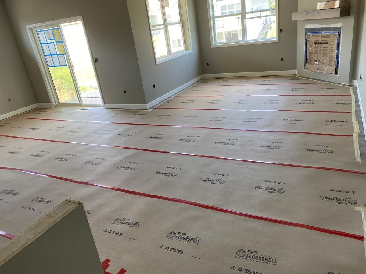 Stage 3 — finished floor covered with protective paper
