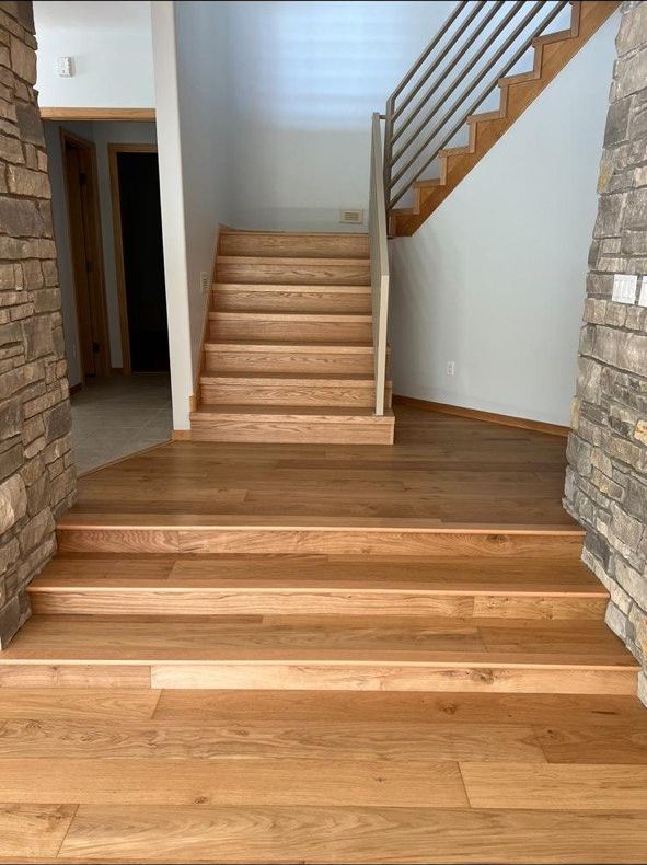 White oak stairs with stone accents